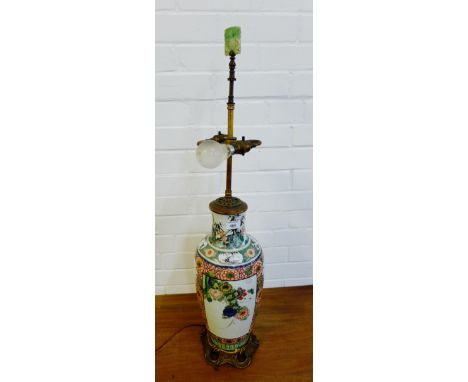 A Famille Verte baluster table lamp with gilt metal mounts and small jade plaque to top with twin light fitting, approx 88cm 