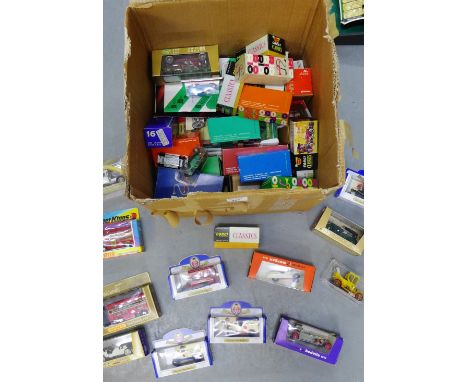 A carton containing miscellaneous model cars to include Corgi Classics, Rio and others, circa 1980's, etc (a lot)