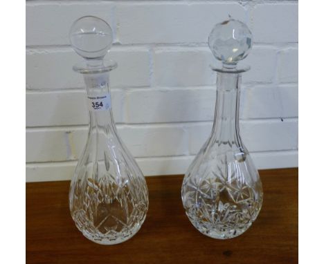 Two cut glass decanter and stoppers (2) 