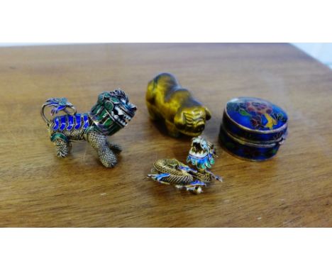A mixed lot to include a tigers eye pot bellied pig, a small Cloisonne pill box, a gilt metal and enamel Dragon brooch and a 