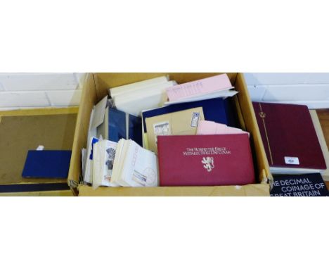 A large lot containing a quantity of First Day Covers, three coin albums and a quantity of sheets of stamps (large lot) 