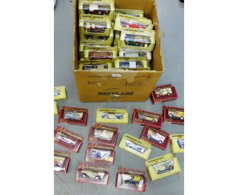 A large collection of Yesteryear and Matchbox model cars and vehicles, circa 1970 & 1980, all boxed (approx 76) 