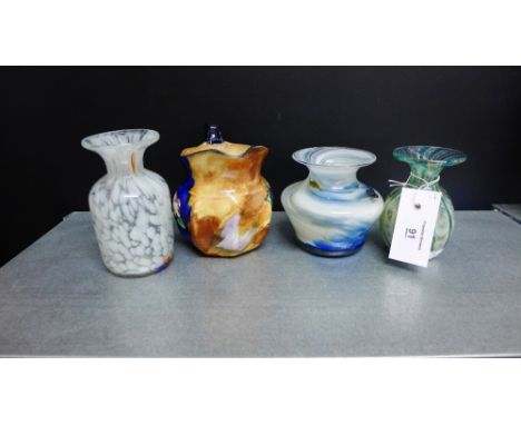 A mixed lot to include two Phoenician glass vases, a Mdina glass vase and a H & K Tunstall 'Viola' patterned jug (4) 