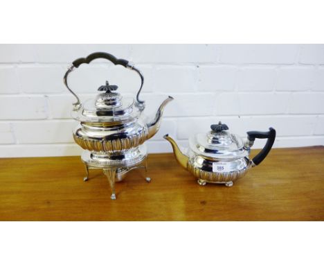 An Epns spirit kettle on stand, together with a teapot with ebonised handle and half gadrooned decoration (2) 