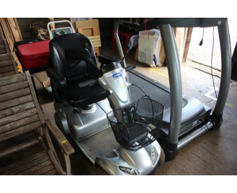 An Invacare mobility scooter with charger 