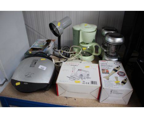 A quantity of various electrical items to include George Foreman, hand mixer, stick blender, desk lamp etc. 