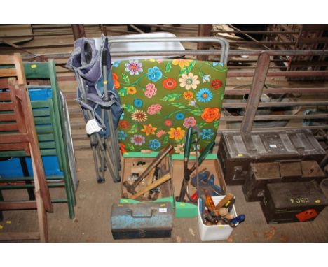 A folding chair; together with a folding table; three boxes of tools and a tool box and contents 