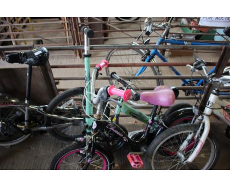 A scooter; together with two children's bikes 