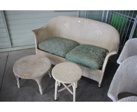 A two seater wicker conservatory sofa, together with two side tables