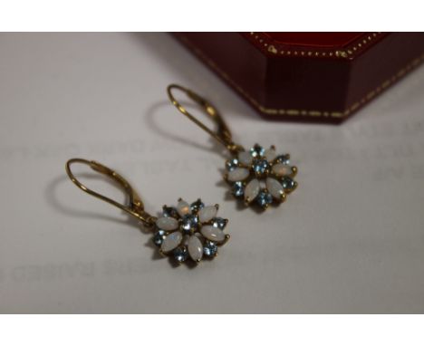 A PAIR OF CULTURED OPAL AND BLUE TOPAZ EARRINGS