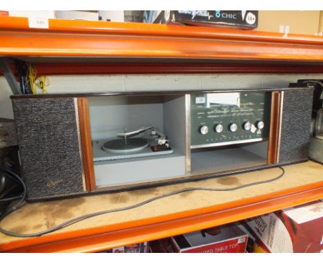 A VINTAGE MARCONIPHONE RADIOGRAMME WITH GARRARD RECORD DECK (MINUS LEGS)