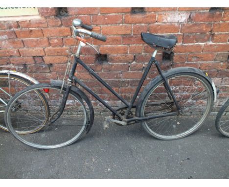 A VINTAGE RALEIGH BICYCLE