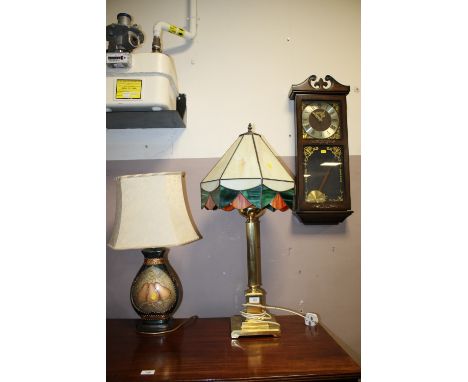 A BRASS TABLE LAMP WITH TIFFANY STYLE SHADE, CERAMIC LAMP AND A MODERN WALLCLOCK