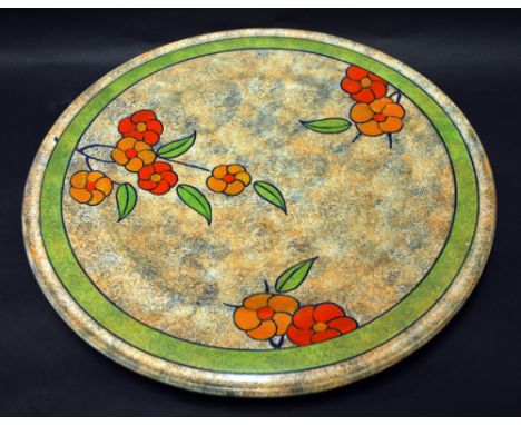 Burleigh Ware circular wall charger with tube lined decoration in the manor of Charlotte Rhead. Approximately 360mm diameter.