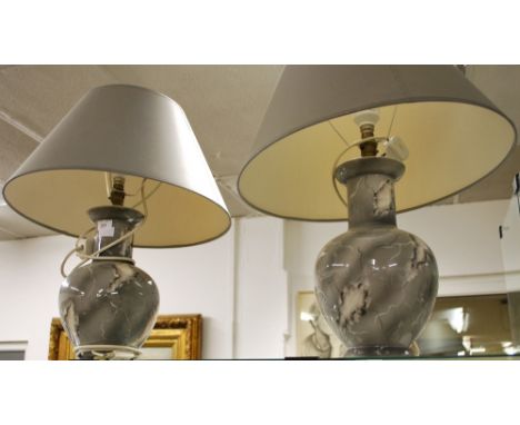 A pair of large ceramic table-lamps with shades. by Pedro S. Alves of London.