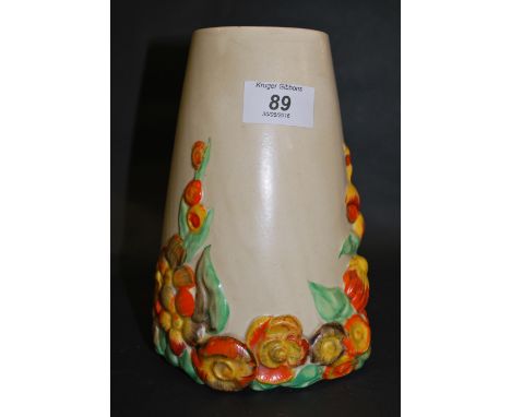 Clarice Cliff, a painted and relief-decorated vase with floral designs. Approximately 19 cm tall. 