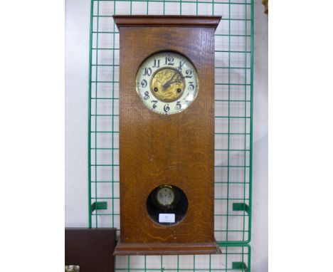 An oak wall clock