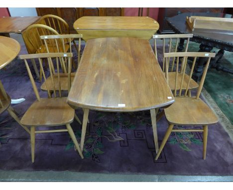 An Ercol Blonde drop-leaf table and four chairs