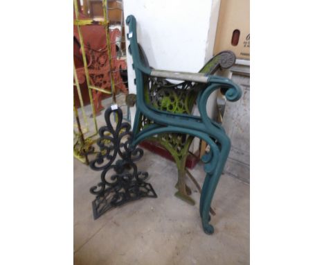 Two pairs of cast iron bench ends and a stand