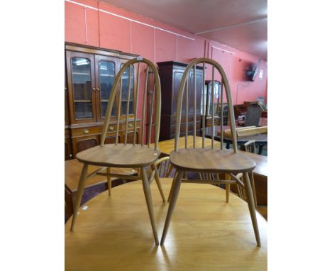 A pair of Ercol Blonde chairs