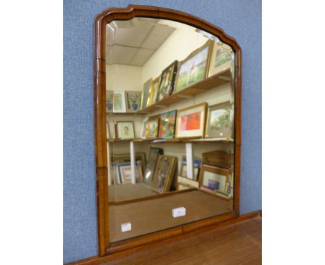 A Queen Anne style walnut cushion framed mirror