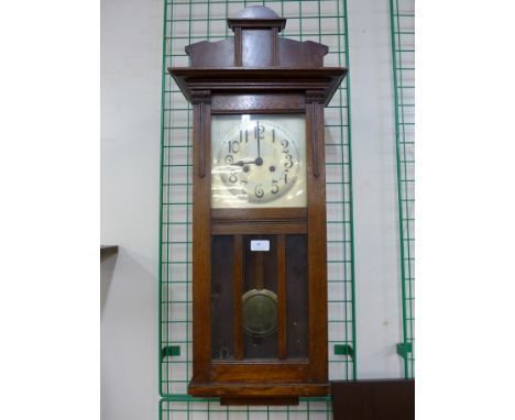 An oak wall clock