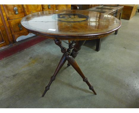 A 19th Century Italian Sorrento olive wood and marquetry inlaid circular tripod table