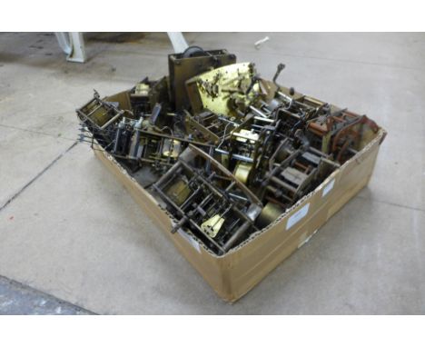 A box of assorted clock movements