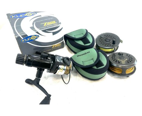 Kudos z900 fishing reel in original box, dragonfly concept disc 395 and a Dragon fly cartridge 395.