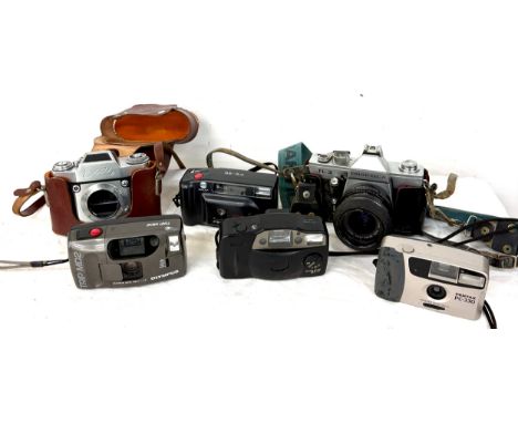 Selection of 35mm film cameras to include Minolta FS35, Pentax PC-330, Olympus Trip MD2, Canon Sure shot AF7, Exa, Praktica L