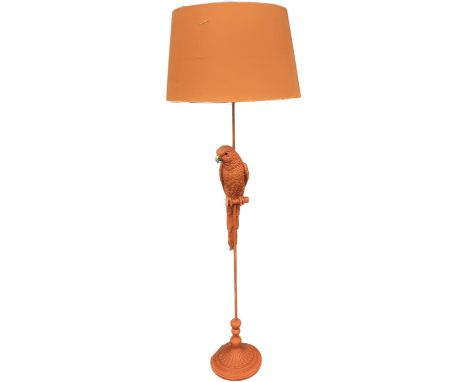 Floor standing bright orange lamp with a decorative parrot overall height approximately 62 inches tall