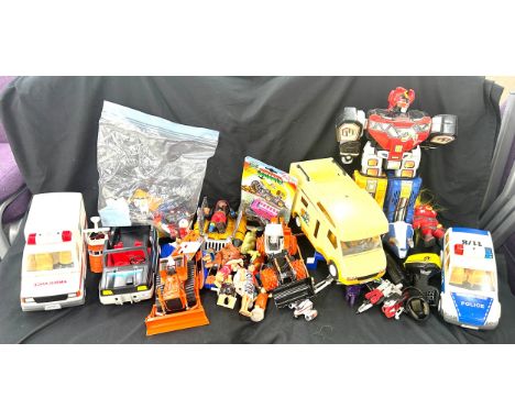 Large selection of toys includes Robot, Care bear toy etc