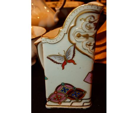 Small Royal Worcester triangular cream jug   CONDITION REPORT:  Wear to the gilt on the spout