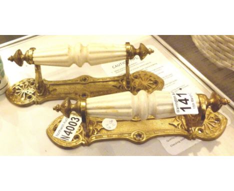 Pair of French brass and ceramic door pulls 