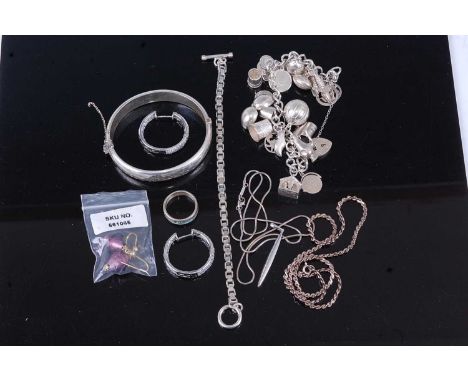 Assorted silver and white metal jewellery, to include hinged bangle, neck chain, charm bracelet, ring etc 