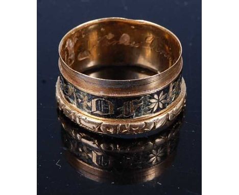 A George IV 18ct gold and black enamel mourning ring, inscribed to inside of band, 3.6g, size M/N (with enamel loss and compl