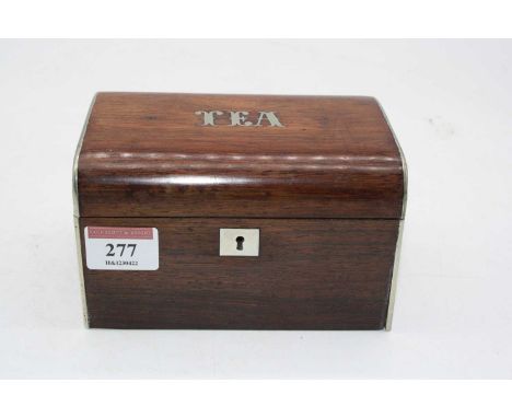 A Victorian rosewood tea caddy, the hinged domed top inlaid Tea in pewter, opening to reveal single compartment interior, w.1