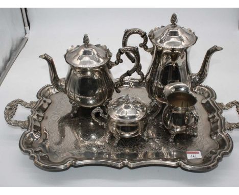 A silver plated four-piece tea and coffee service, on twin handled serving tray 