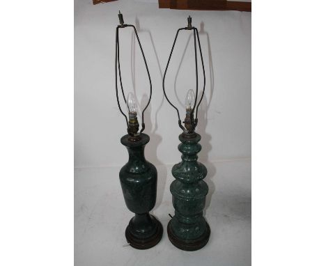 A large green serpentine table lamp on wooden base, h.45cm (excluding fittings); together with one other similar example (2)