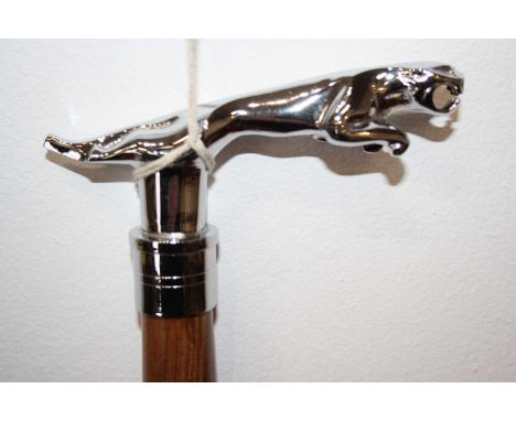 A reproduction walking stick, the handle in the form of a Jaguar car mascot, 92cm 