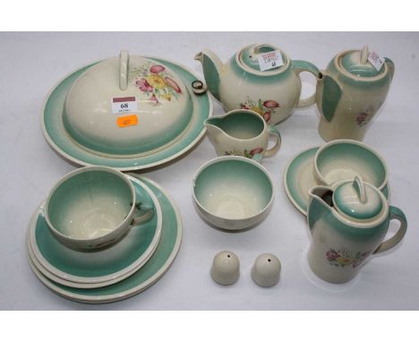 A 1930s Susie Cooper Crown Burslem Works part tea service on a cream and green ground with floral decoration printed mark ver