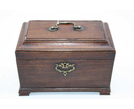 A George III mahogany tea caddy, the cavetto moulded lid lifting to reveal three compartments, having pierced brass escutcheo