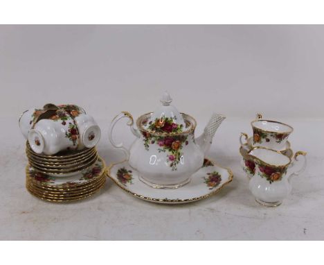 A Royal Albert 6 place setting tea service in the Old Country Roses pattern