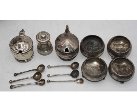 Four Victorian silver salts, of squat circular form, on ball feet; together with two silver mustards and a silver pepper grin