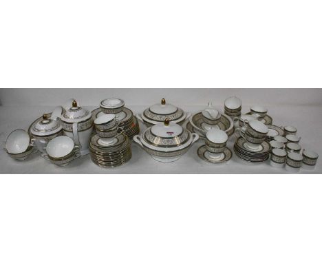 An extensive Minton 8 place setting dinner and tea service in the Aragon patternThe coffee pot spout is cracked.There are man