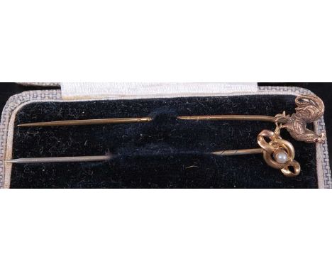 An Edwardian 9ct gold and ruby set tie-pin, modelled as a cockerel, 65mm; together with a pinchbeck and faux seed pearl set e