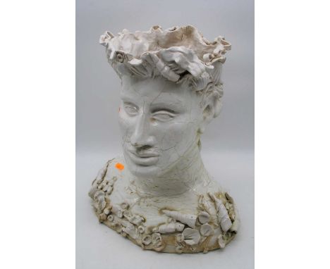 A 20th century white crackle glazed head and shoulders portrait bust of a man, encrusted with seashells, height 39cm