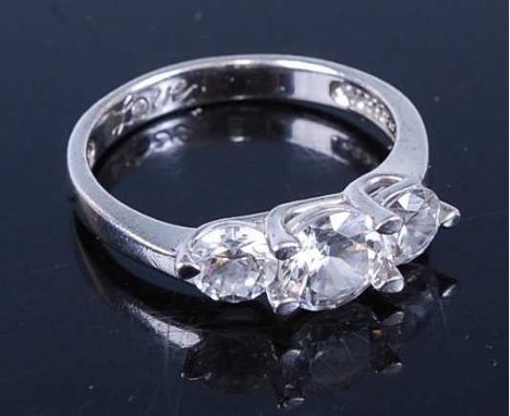 A white metal and cz set three-stone ring, stamped 925, 3.4g, size Q