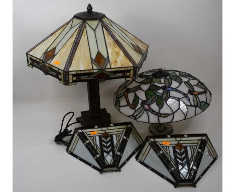 A 20th century Tiffany style table lamp, 50cm high, together with another similar, and  a similar pair of wall lights 