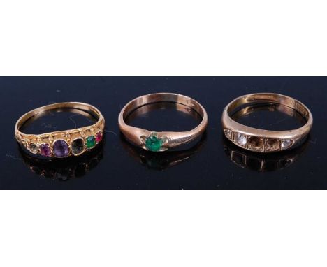 A 9ct gold cz set dress ring (2 stones missing); together with a yellow metal multi-stone ring (1 stone missing); and a gilt 